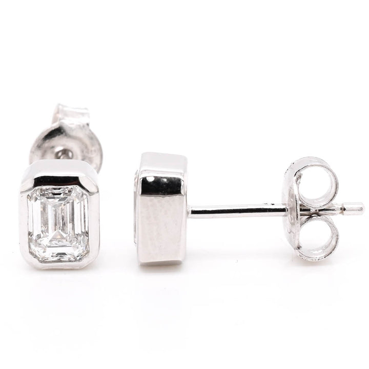 Graziella Sterling Silver 1.00CTW Emerald Shape LAB Created Diamond Stud Earrings.