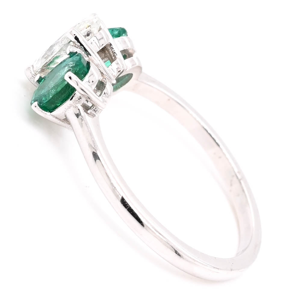 14KT White Gold 0.81CT Oval Shape Diamond & Emerald Ring..