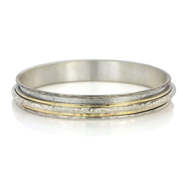 Sauca Meditation Bangle. Sterling Silver, 10KT Yellow Gold, and White