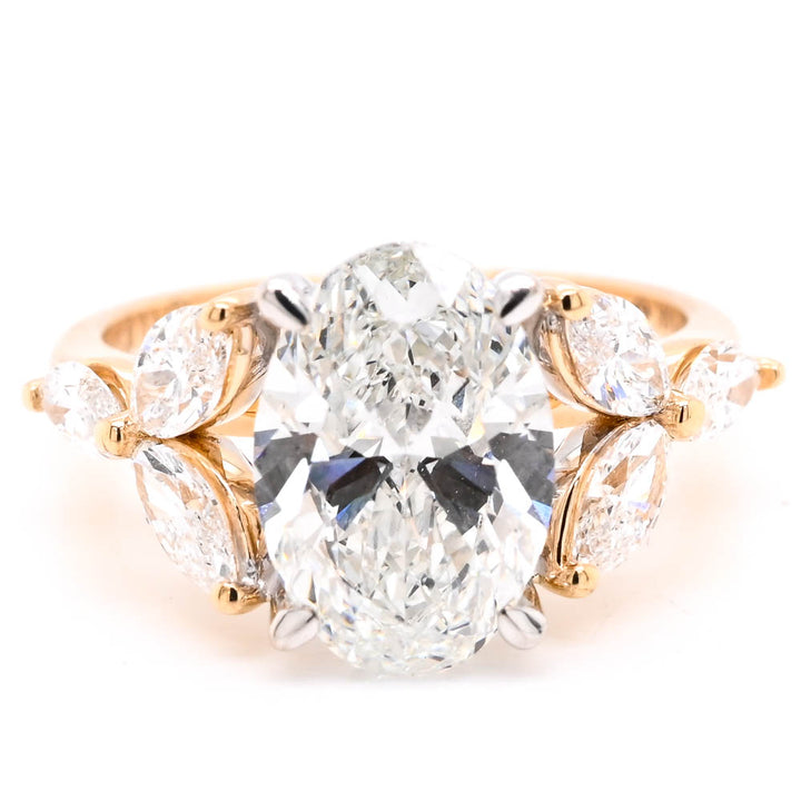 14KT Yellow Gold 3.40CTW Oval Shape Diamond Accented Engagement Ring.
