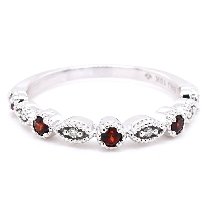 10KT White Gold Garnet & Diamond Band.
