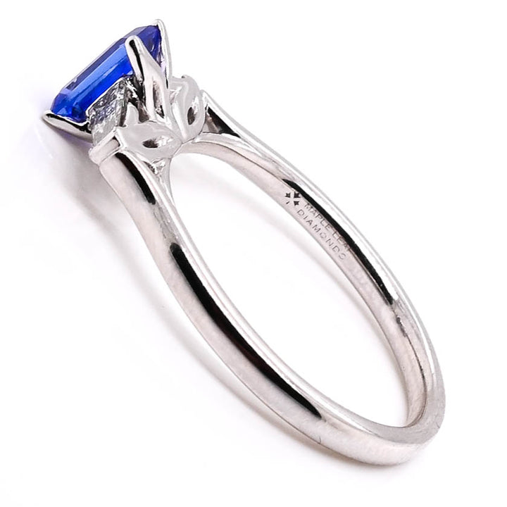 18KT White Gold 0.55CT Emerald Shape Tanzanite and Diamond Ring.