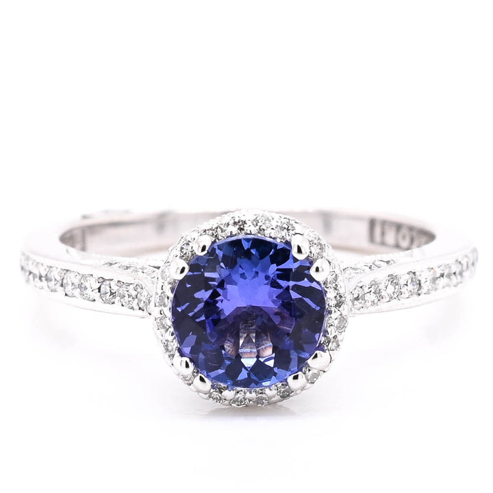 18KT White Gold 1.02CT Round Brilliant Tanzanite & Diamond Halo Set Ring.