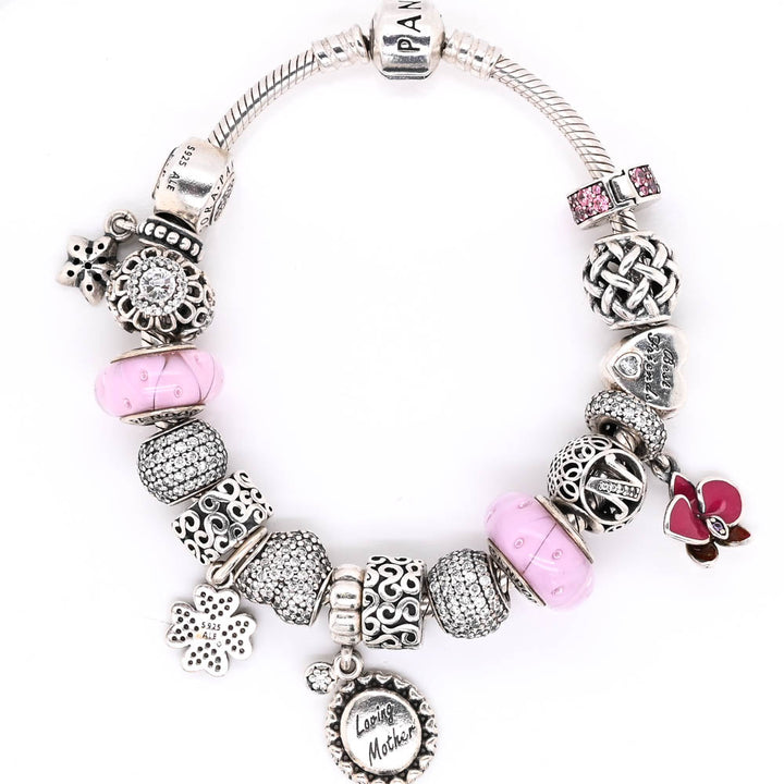 Pre-Owned Gently Worn Authentic Pandora Seterling Silver 19cm Bracelet with 17 Assorted Pandora  Charms.