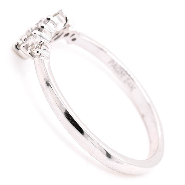 14KT White Gold 0.18CTW Diamond Ring.