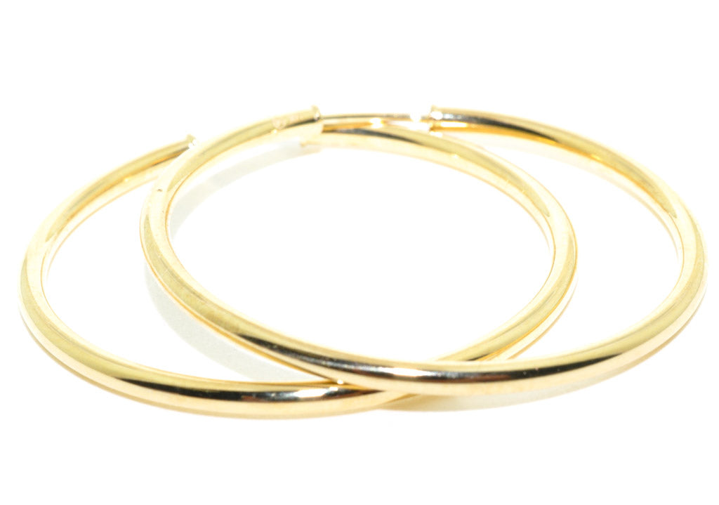 14 Karat Yellow Gold Medium Hoop Earrings.