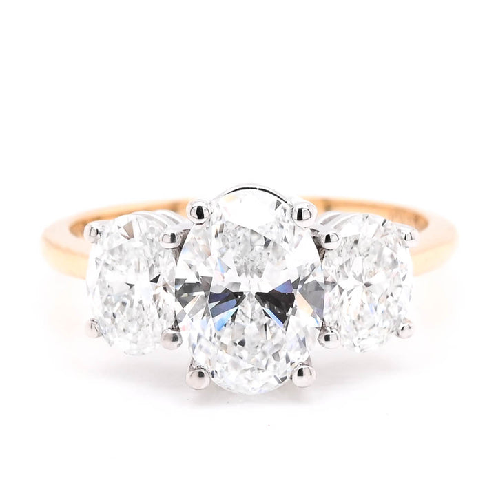 14KT Yellow & White Gold 2.50CTW Oval Shape Lab Created Diamond 3 Stone Engagement Ring.