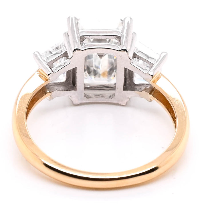 14KT White & Yellow Gold 4.00CTW Emerald Shape Lab Created 3 Stone Engagement Ring.