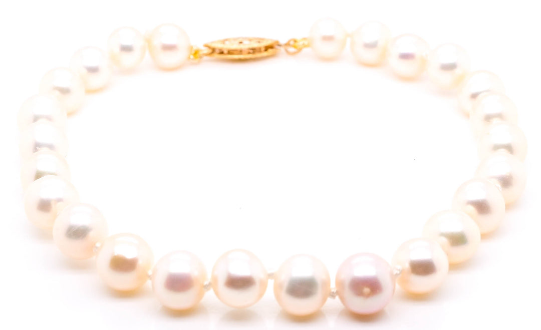 14KT Yellow Gold 7.5"6.5-7mm Pearl Bracelet.