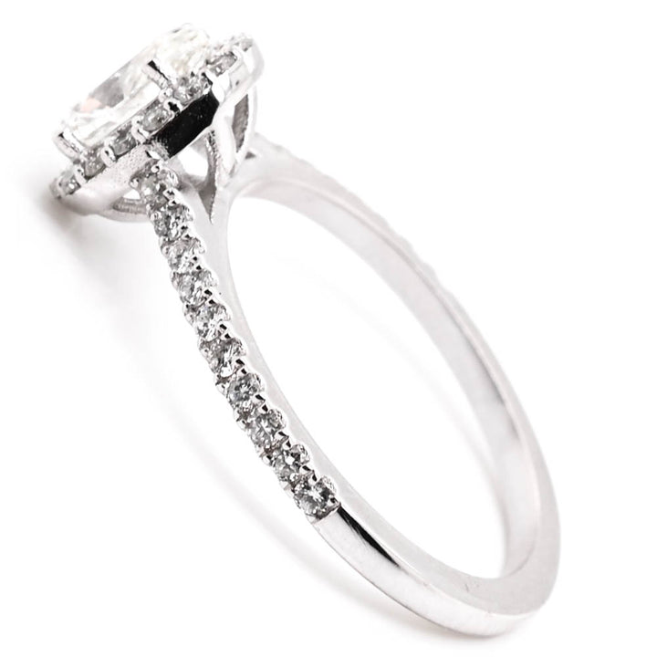 14KT White Gold 1.05CTW Oval Shape Diamond Halo Set Engagement Ring.