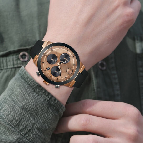 Movado BOLD Fusion, 44 mm bronze ion-plated stainless steel case &amp; black ceramic bezel with a bronze chronograph dial on black silicone strap. 3600711.