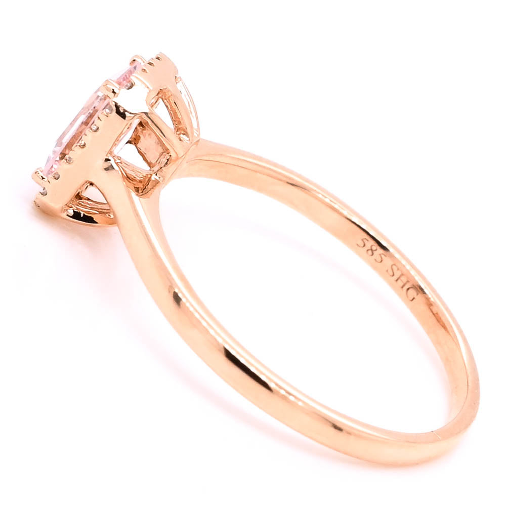 14KT Rose Gold 0.49CT Emerald shape Morganite & Diamond Ring.

Diamo