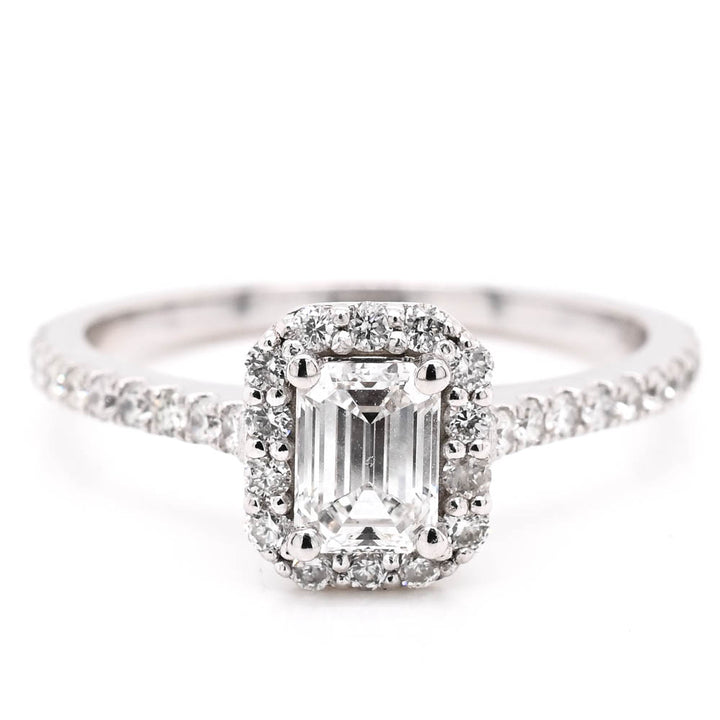 14KT White Gold 0.87CTW Emerald Shape Halo Set Canadian Diamond Engagement Ring.