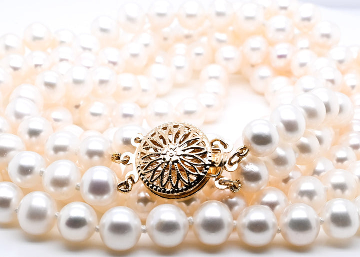 14KT Yellow Gold 18" 7.5-8MM 3 Strand Freshwater Pearl Necklace.