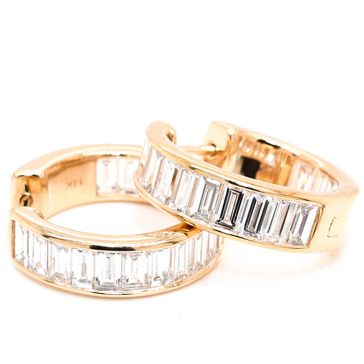 14KT Yellow Gold 3.38CTW LAB Created Baguette Diamond Huggie Earrings.