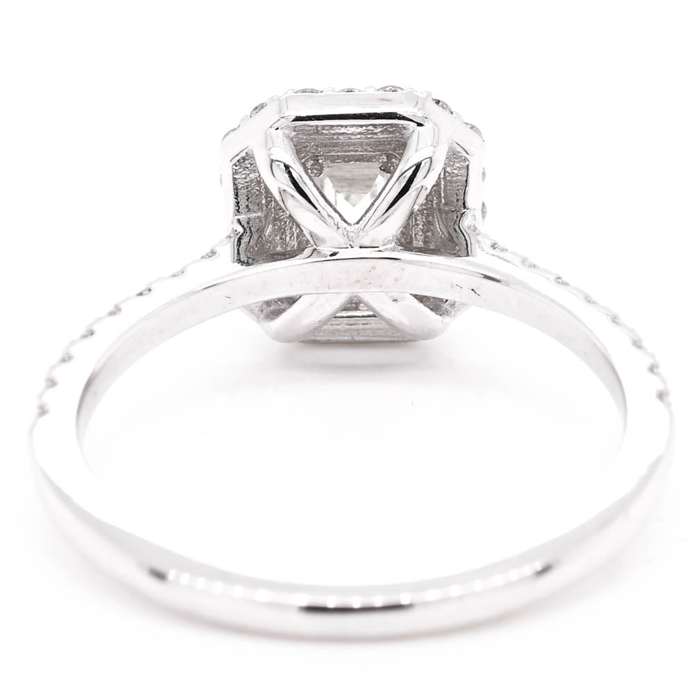 14KT White Gold 1.10CTW Emerald Cut Canadian Diamond Double Halo Engagement Ring.