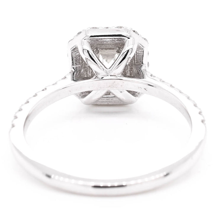 14KT White Gold 1.10CTW Emerald Cut Canadian Diamond Double Halo Engagement Ring.
