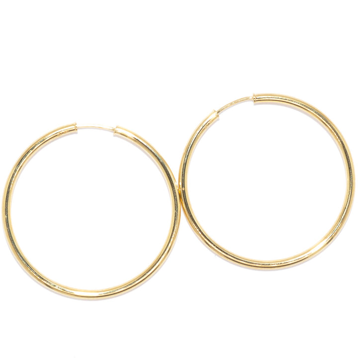 14 Karat Yellow Gold Medium Hoop Earrings.