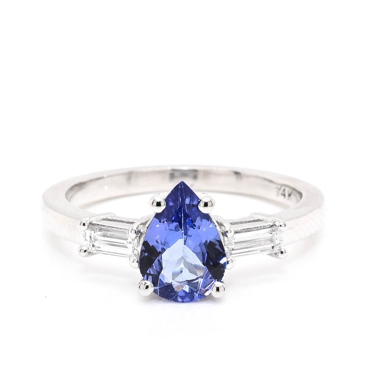 14KT White Gold 1.01CT Pear Shape Tanzanite & Diamond Trinity Ring.