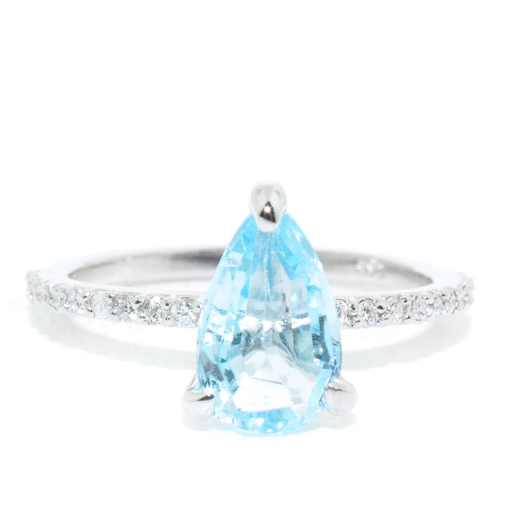 10KT White Gold 1.70CT Pear shape Blue Topaz and Diamond Ring.