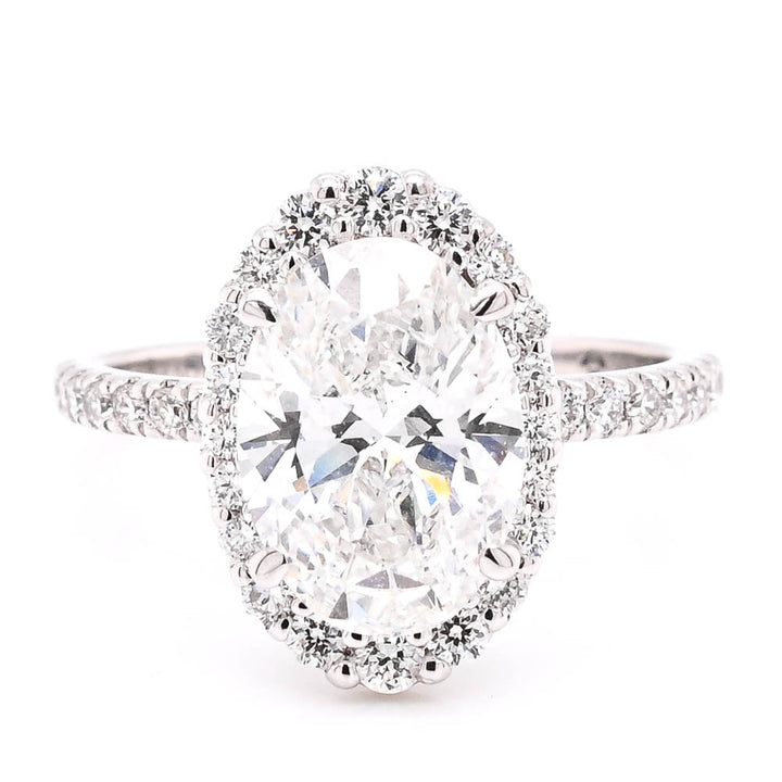 14KT White Gold 3.00CTW Oval Shape LAB Created Diamond Halo Set Engagement Ring.