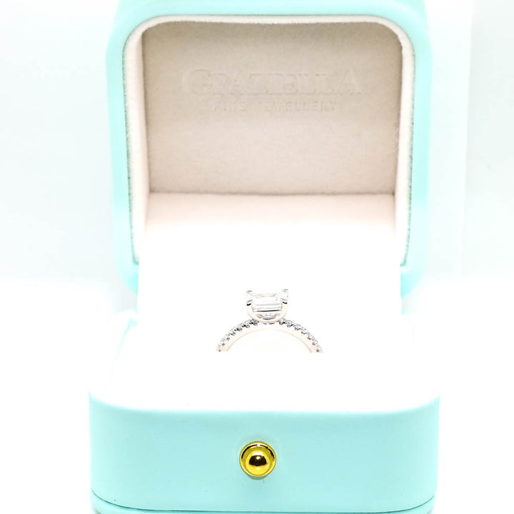 Graziella 10KT White Gold 1.20CTW Emerald Shape LAB Created Diamond Engagement Ring.