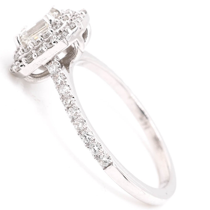 14KT White Gold 1.10CTW Emerald Cut Canadian Diamond Double Halo Engagement Ring.