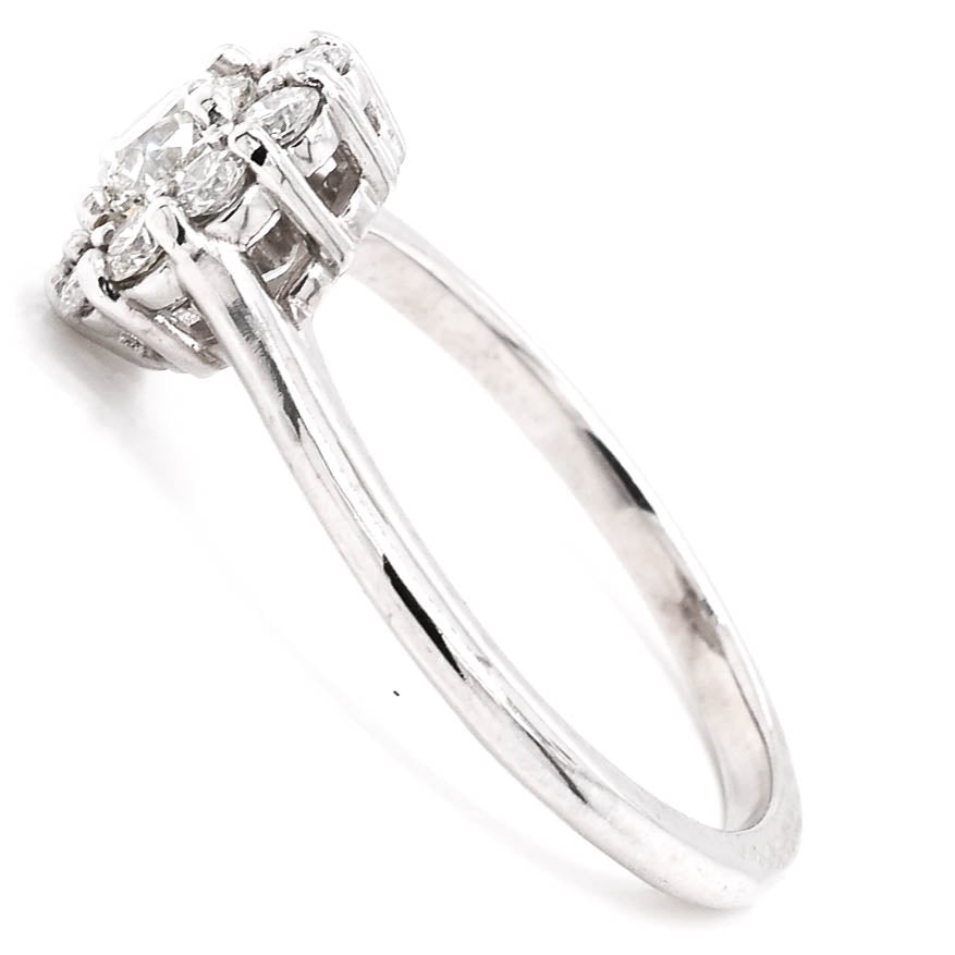 Platinum 0.83CTW Round Brilliant Diamond Halo Set Engagement Ring.