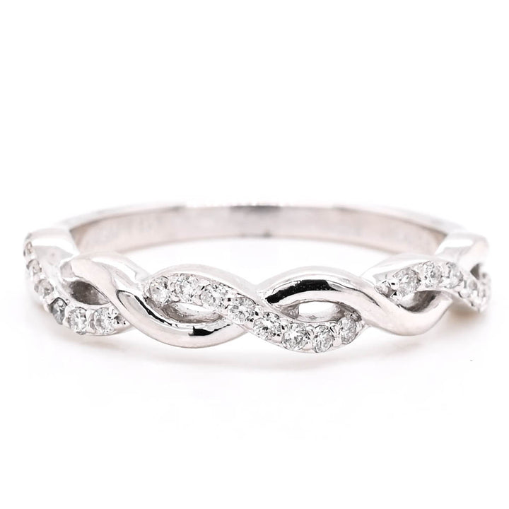 14KT White Gold 0.18CTW Diamond Infinity Ring.