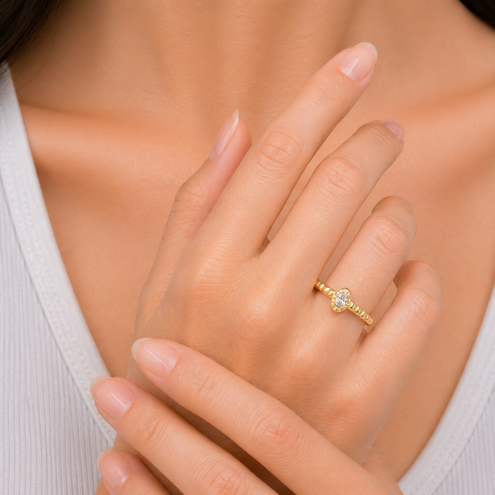 14KT Yellow Gold 0.07CTW Oval Shape Diamond Stackable Ring.
