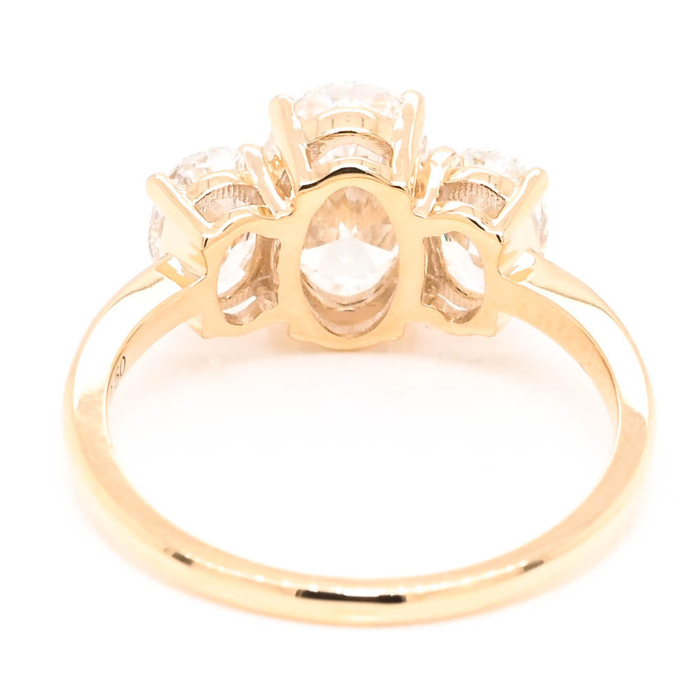 10KT Yellow  Gold 2.50CTW Oval Shape Lab Created Diamond 3 Stone Engagement Ring.