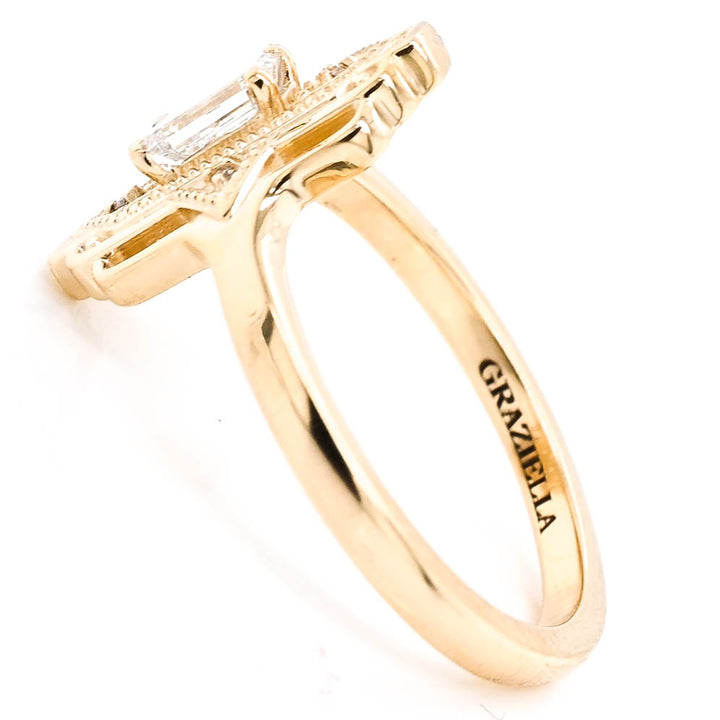 14KT Yellow Gold 0.46CTW Emerald Shape Canadian Diamond Ring.