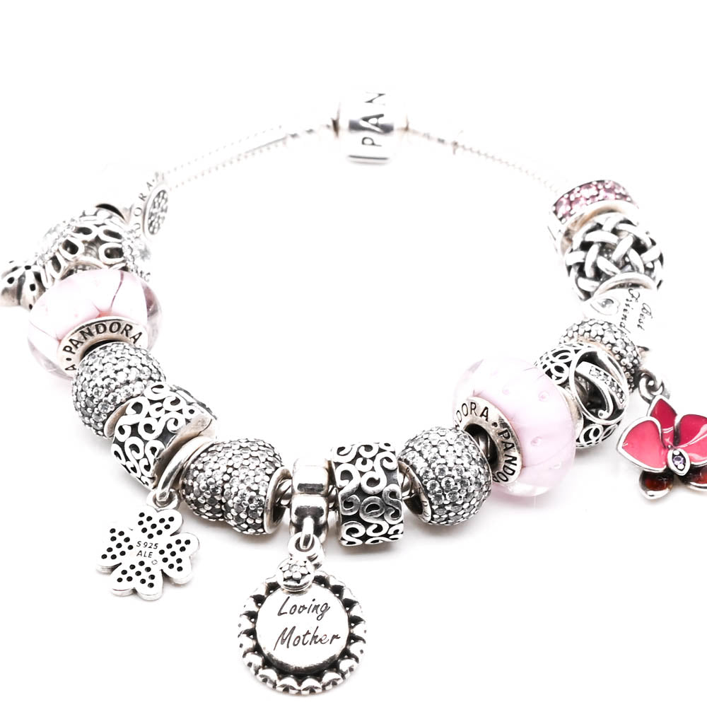 Pre-Owned Gently Worn Authentic Pandora Seterling Silver 19cm Bracelet with 17 Assorted Pandora  Charms.