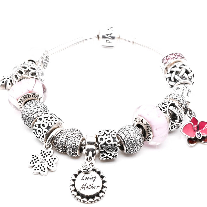 Pre-Owned Gently Worn Authentic Pandora Seterling Silver 19cm Bracelet with 17 Assorted Pandora  Charms.