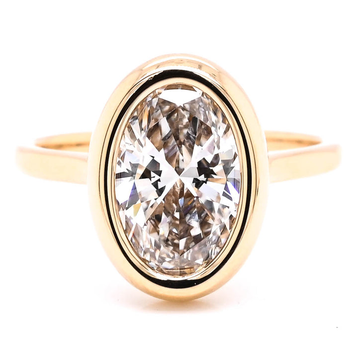 14KT Yellow Gold 3.00CT Oval Shape LAB Created Bezel Set Diamond Solitaire Engagement Ring.