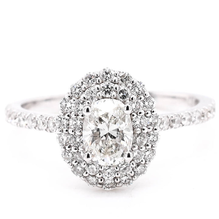 14KT White Gold 1.00CTW Oval Shape Diamond Double Halo Set Engagement Ring.