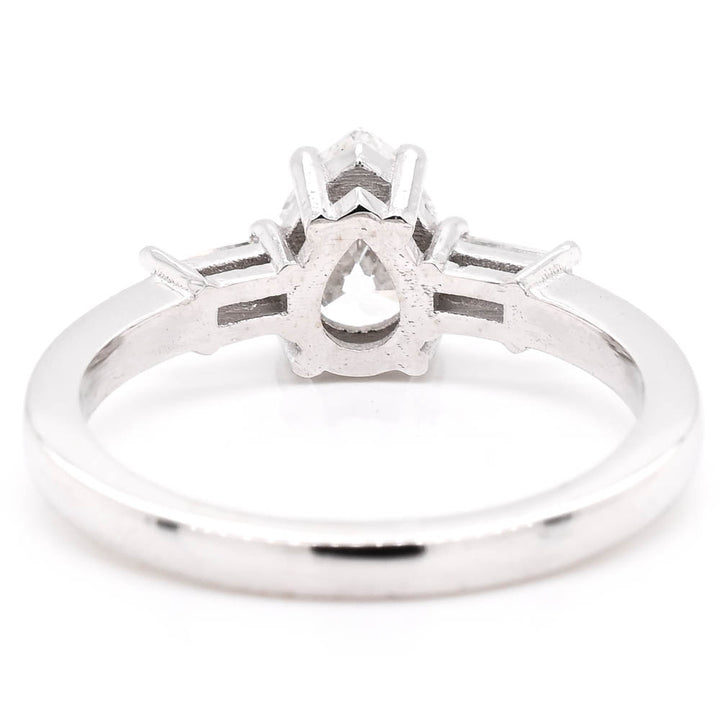 14KT White Gold 1.23CTW Pear Shape Diamond 3 Stone Engagement Ring.