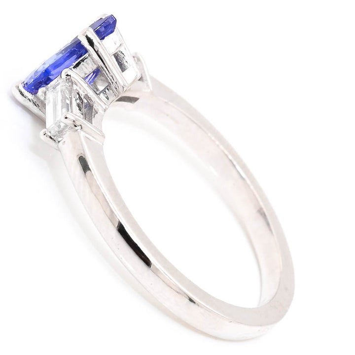 14KT White Gold 1.01CT Pear Shape Tanzanite & Diamond Trinity Ring.