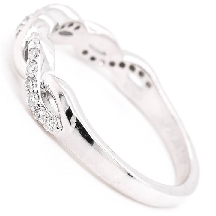 14KT White Gold 0.18CTW Diamond Infinity Ring.