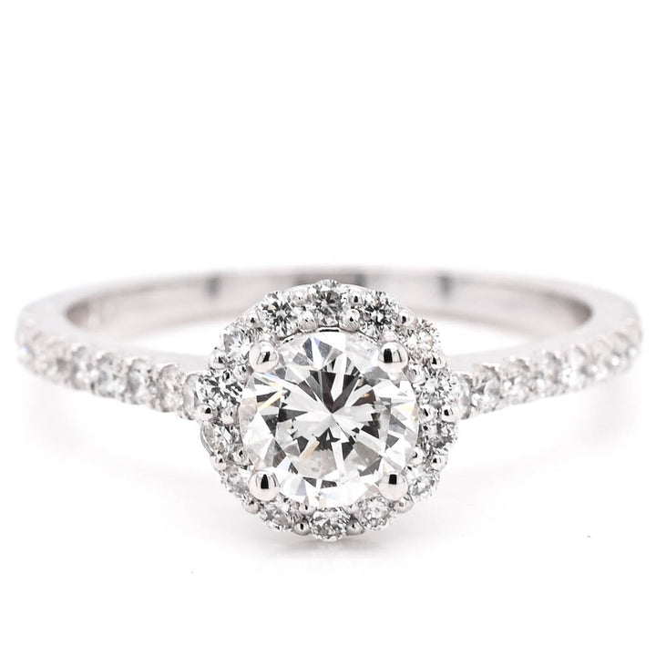 14KT White Gold 0.78CTW Round Brilliant Halo Set Diamond Engagement Ring.