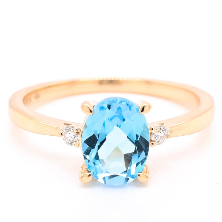 Fire & Ice 10KT Yellow Gold Blue Topaz & Canadian Diamond Ring.