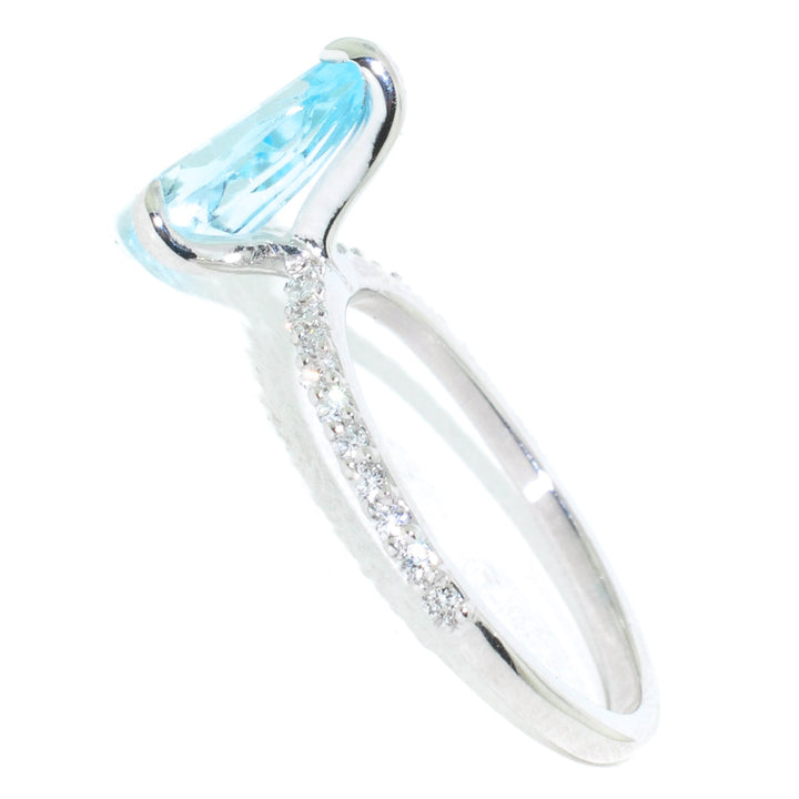10KT White Gold 1.70CT Pear shape Blue Topaz and Diamond Ring.