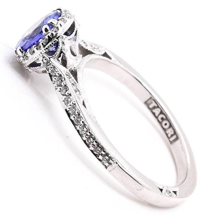 18KT White Gold 1.02CT Round Brilliant Tanzanite & Diamond Halo Set Ring.