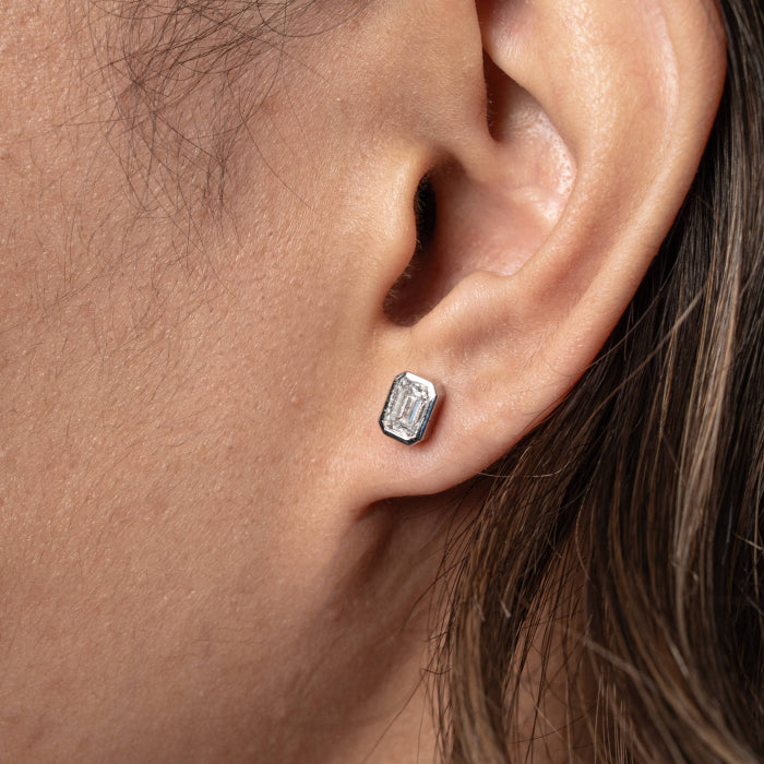 Graziella Sterling Silver 1.00CTW Emerald Shape LAB Created Diamond Stud Earrings.