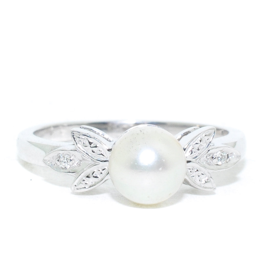 10KT White Gold 4MM Cultured Pearl and Diamond Ring.