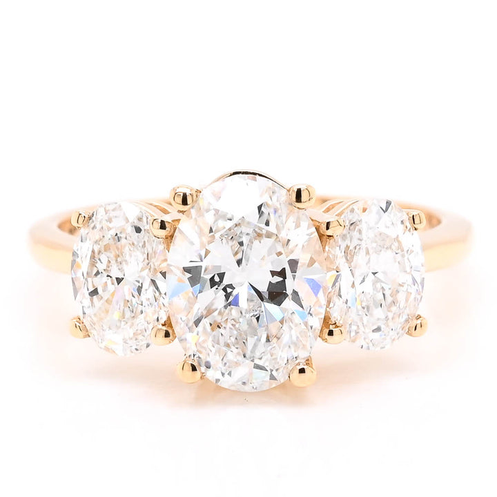 14KT Yellow  Gold 2.50CTW Oval Shape Lab Created Diamond 3 Stone Engagement Ring.