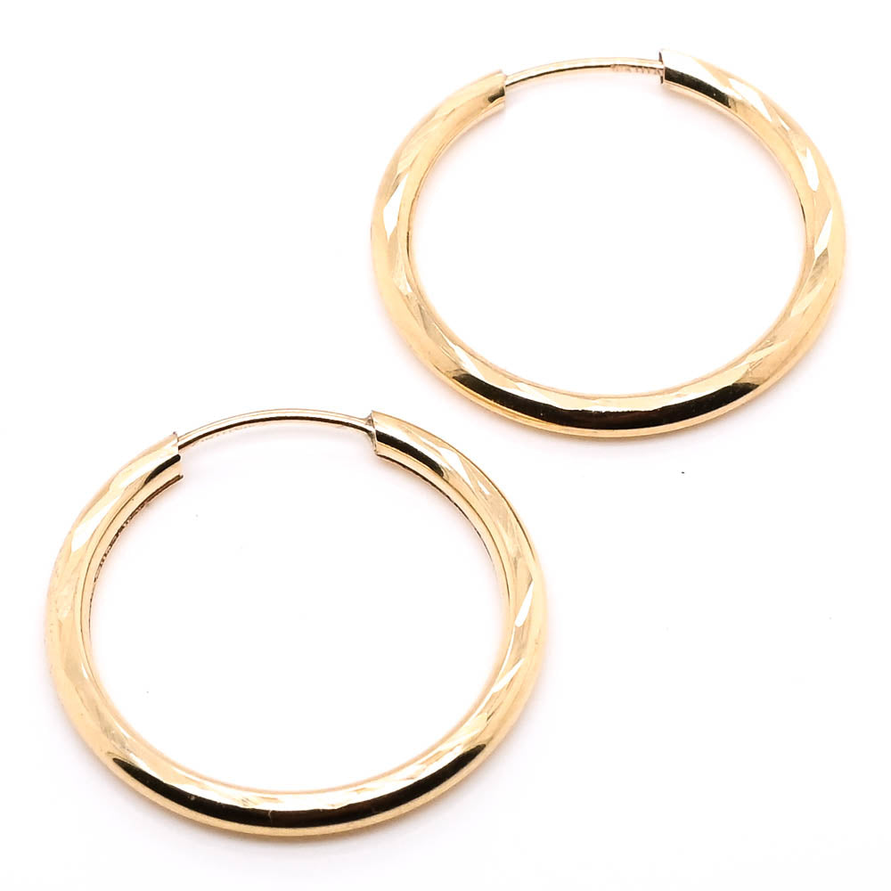 10KT Yellow Gold 18mm Sleeper Earrings.