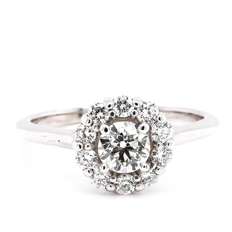 Platinum 0.83CTW Round Brilliant Diamond Halo Set Engagement Ring.