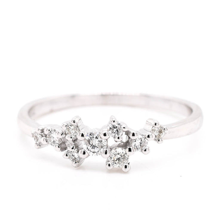 14KT White Gold 0.18CTW Diamond Ring.