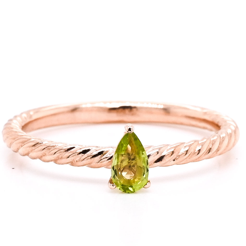 10KT Rose Gold Pear Shape Peridot Ring.

Peridot: 5x3mm
Band Width: